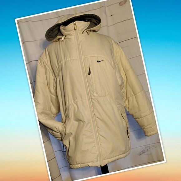 Nike insulated winter parka size small with removable hood and adjustable cuffes